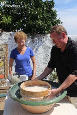 Clients of Portugal Premium Tours doing a bread workshop